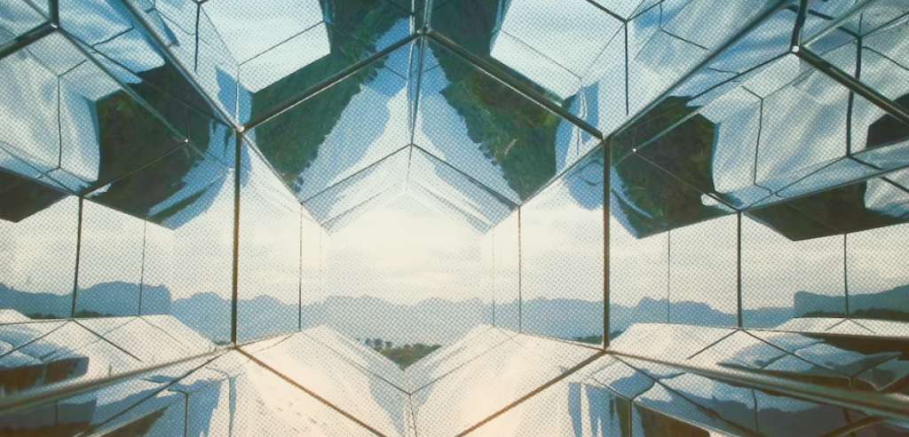 Imagem ilustrativa com padrões geométricos de espelho representando o design de futuros.